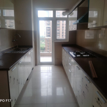 Kitchen in 3 BHK Apartment at Emaar Palm Heights, Sector 77 – for Rent