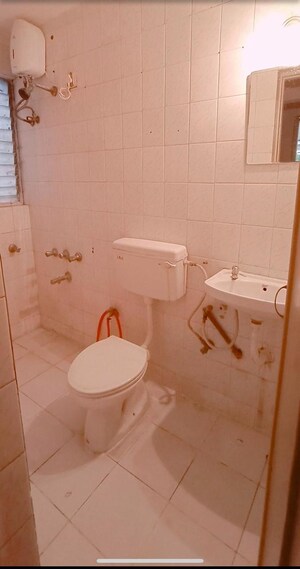 Bathroom in 2 BHK Apartment at Karia Konark Pooram, Kondhwa – for Rent