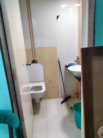Bathroom in 2 BHK Apartment at Palash Towers, Andheri West – for Rent