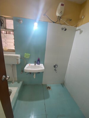 Bathroom in 3 BHK Apartment at Kumar Palmgrove, Kondhwa – for Rent