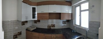 Kitchen in 3 BHK Apartment at Gaur City 2 - 14th Avenue, Sector 16c Greater Noida – for Rent