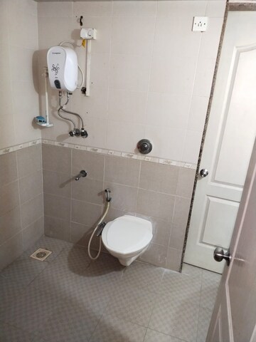 Bathroom in 3 BHK Apartment at Ajmera Beverly Hills and Royal Empire, Andheri West – for Rent
