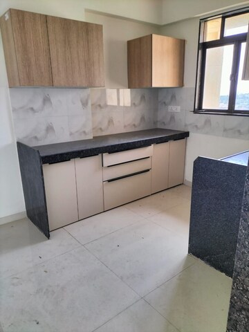 Kitchen in 2 BHK Apartment at Yari Road – for Rent