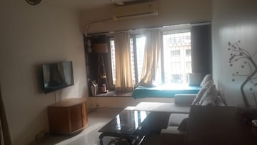 Living Room in 2 BHK Apartment at Palash Towers, Andheri West – for Rent