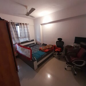 Bedroom in 2 BHK Apartment at Dorabjee Paradise Building A&B Condominium, Mohammadwadi – for Rent