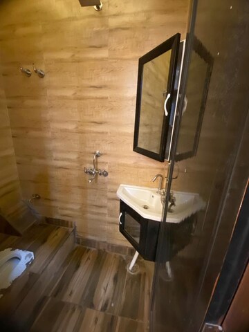Bathroom in 3 BHK Builder Floor at Dwarka Mor – for Sale