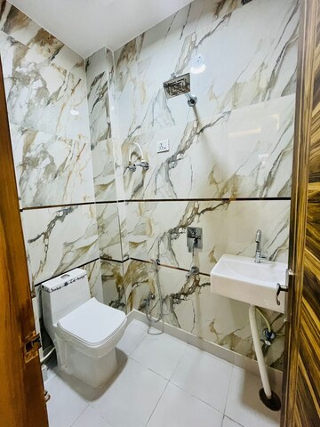 Bathroom in 2 BHK Builder Floor at Dwarka Mor – for Sale