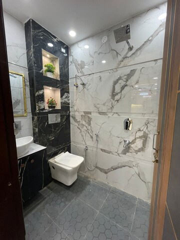 Bathroom in 3 BHK Builder Floor at Dwarka Mor – for Sale