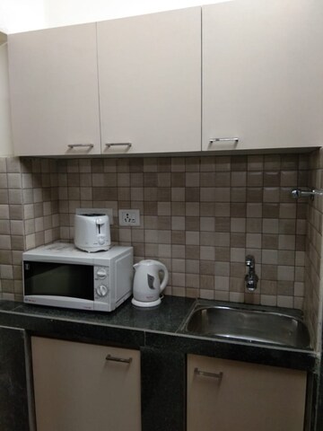 Kitchen in Studio Apartment at Arpora – for Sale