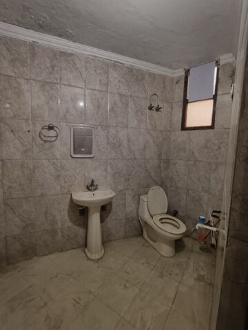 Bathroom in 3 BHK Builder Floor at Dwarka Mor – for Rent