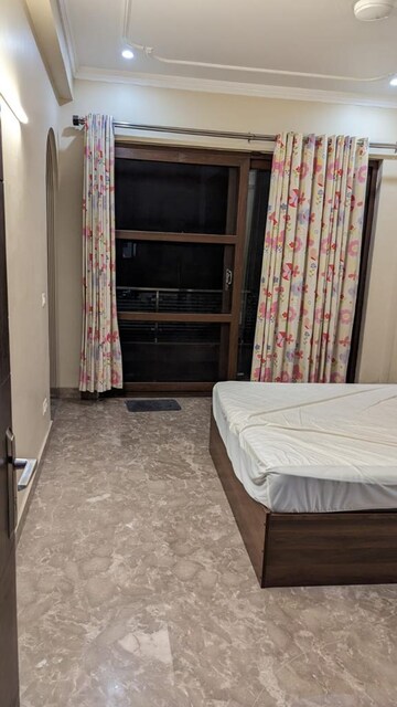 Bedroom in 3 BHK Builder Floor at Ansal Sushant Lok I, Sector 43 – for Rent