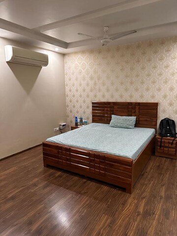 Bedroom in 3 BHK Builder Floor at Ansal Sushant Lok I, Sector 43 – for Rent