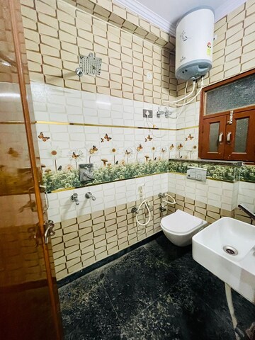 Bathroom in 2 BHK Builder Floor at Dwarka Mor – for Rent