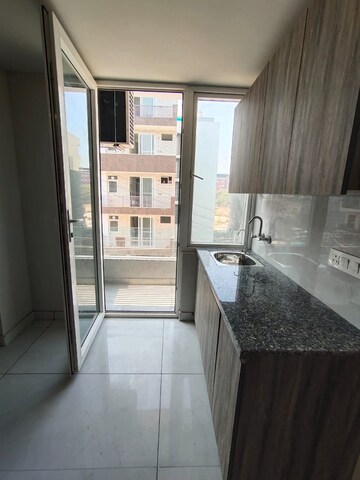 Kitchen in Studio Builder Floor at Ansal Sushant Lok I, Sector 43 – for Rent