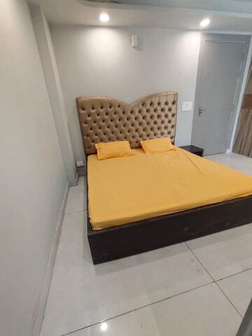 Bedroom in Studio Builder Floor at Ansal Sushant Lok I, Sector 43 – for Rent