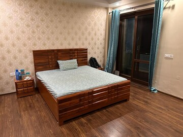 Bedroom in 3 BHK Builder Floor at Ansal Sushant Lok I, Sector 43 – for Rent