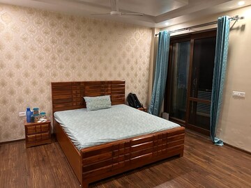 Bedroom in 3 BHK Builder Floor at Ansal Sushant Lok I, Sector 43 – for Rent
