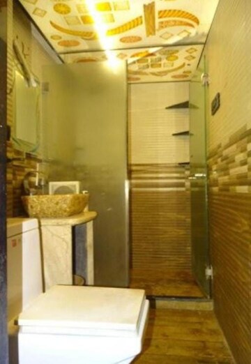 Bathroom in 2 BHK Apartment at Lashkaria Green Towers, Andheri West – for Rent