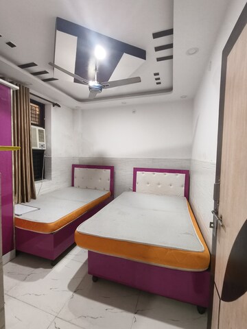 Bedroom in 2 BHK Builder Floor at Dwarka Mor – for Rent