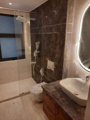 Bathroom in 3.5 BHK Builder Floor at Ansal Sushant Lok I, Sector 43 – for Rent