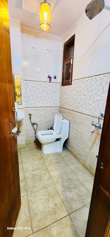Bathroom in 3 BHK Builder Floor at Dwarka Mor – for Rent