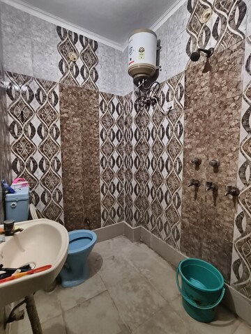 Bathroom in 3 BHK Builder Floor at Dwarka Mor – for Rent