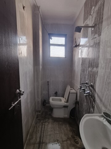 Bathroom in 3 BHK Builder Floor at Dwarka Mor – for Sale