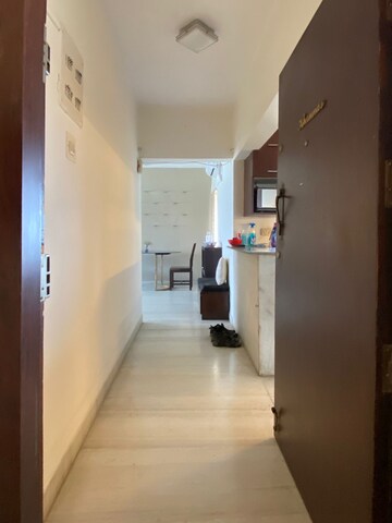 Living Room in 2 BHK Apartment at Palash Towers, Andheri West – for Rent