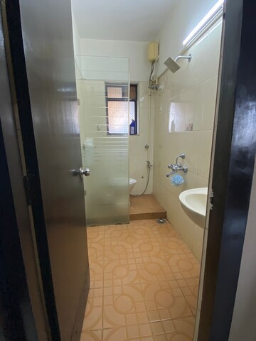 Bathroom in 2 BHK Apartment at Palash Towers, Andheri West – for Rent