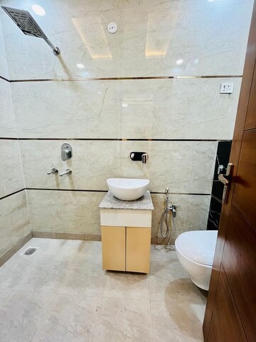 Bathroom in 4 BHK Builder Floor at Dwarka Mor – for Sale