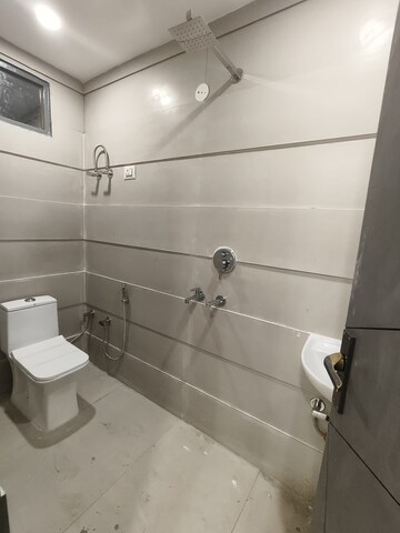 Bathroom in 2 BHK Builder Floor at Dwarka Mor – for Sale