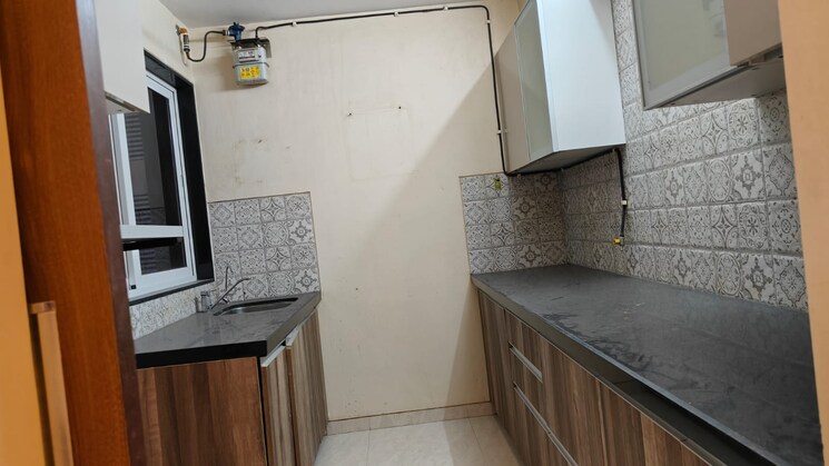 Kitchen, lokhandwala complex 2 Bedroom 900 Sq.Ft. Apartment In Lokhandwala Complex Mumbai 6064931
