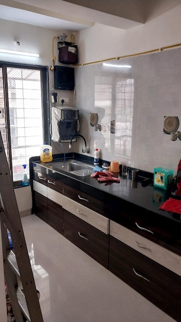 Kitchen in 2 BHK Apartment at Cosmic Basera Apartments, Andheri West – for Rent