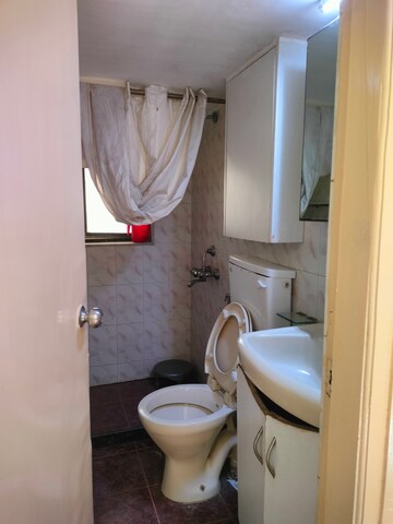 Bathroom in 2 BHK Apartment at Deep Tower, Andheri West – for Rent