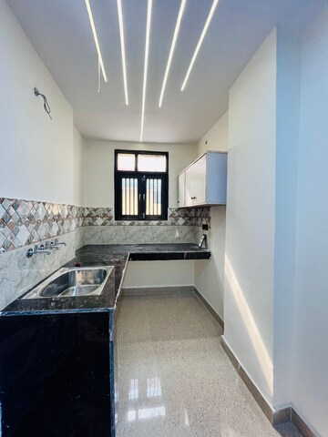 Kitchen in 2 BHK Builder Floor at Dwarka Mor – for Rent