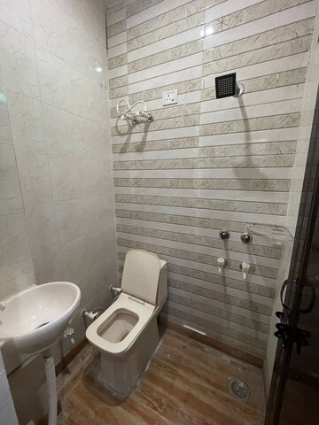 Bathroom in 3 BHK Builder Floor at Dwarka Mor – for Rent
