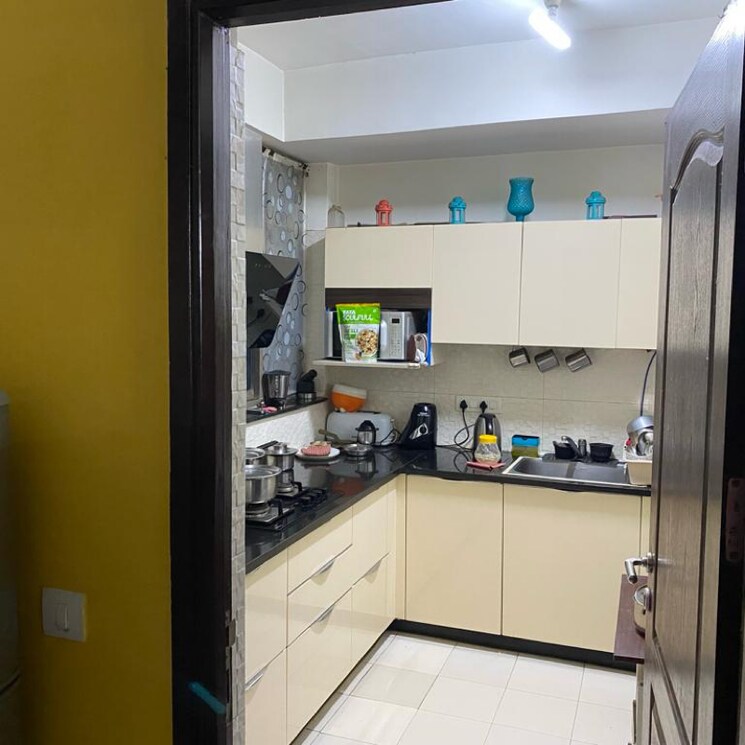 Kitchen, unitech-uniworld-gardens-2 2 Bedroom 973 Sq.Ft. Apartment In Sector 47 Gurgaon 6148929