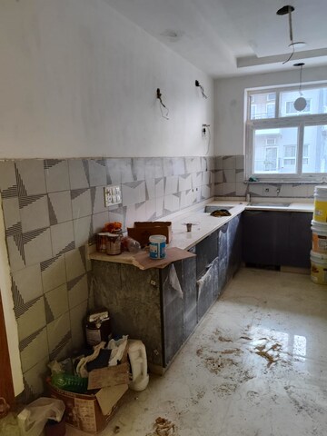 Kitchen in 3 BHK Builder Floor at Puri Aman Vilas, Sector 89 – for Sale