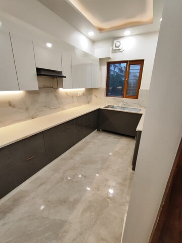 Kitchen in 3.5 BHK Builder Floor at Puri Aman Vilas, Sector 89 – for Sale