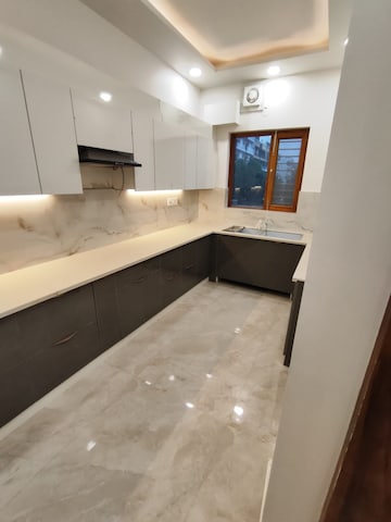 Kitchen in 3.5 BHK Builder Floor at Puri Aman Vilas, Sector 89 – for Sale