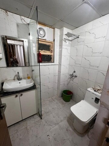 Bathroom in 3 BHK Apartment at Auric City Homes, Sector 82 – for Sale
