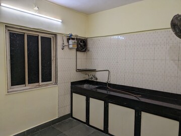 Kitchen in 2 BHK Apartment at Shri Bimla Apartment, Andheri East – for Rent