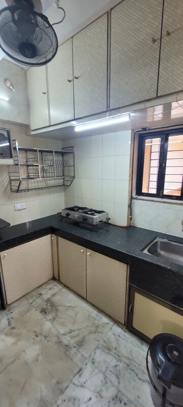 Kitchen in 2 BHK Apartment at Neelyog Apartments, Ghatkopar East – for Rent