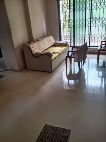 Living Room in 2 BHK Apartment at Parsik Nagar – for Sale