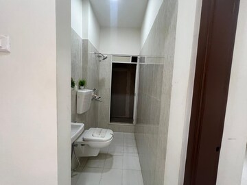 Bathroom in 2 BHK Apartment at Unnati Woods CHS, Kasarvadavali – for Sale