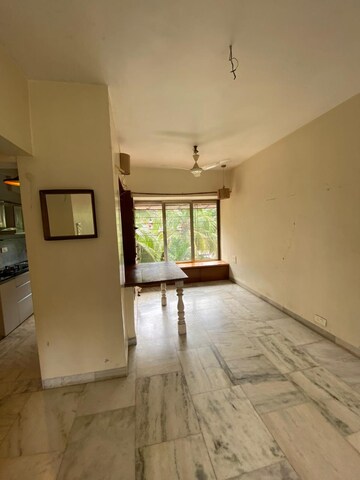 Living Room in 2 BHK Apartment at Chanchal Kalyan Complex, Yari Road – for Sale