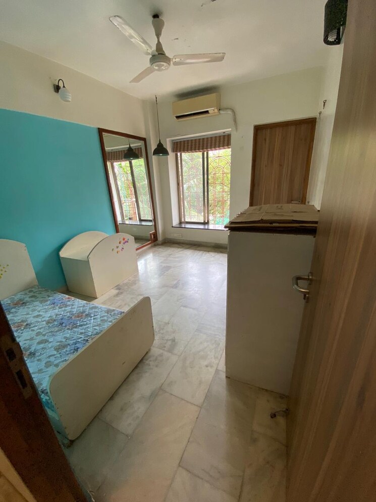 Master Bedroom, chanchal-kalyan-complex 2 Bedroom 825 Sq.Ft. Apartment In Yari Road Mumbai 6217521