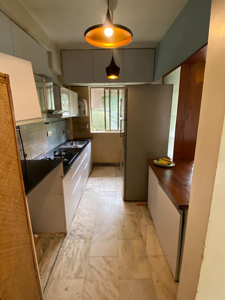 Kitchen, chanchal-kalyan-complex 2 Bedroom 825 Sq.Ft. Apartment In Yari Road Mumbai 6217521