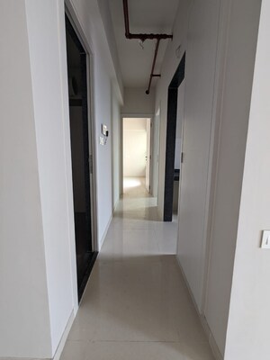 Building Lobby in 2 BHK Apartment at Rustomjee Urbania, Majiwada – for Rent