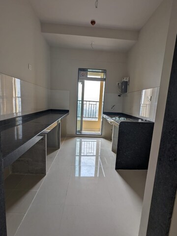 Kitchen in 2 BHK Apartment at Rustomjee Urbania, Majiwada – for Rent
